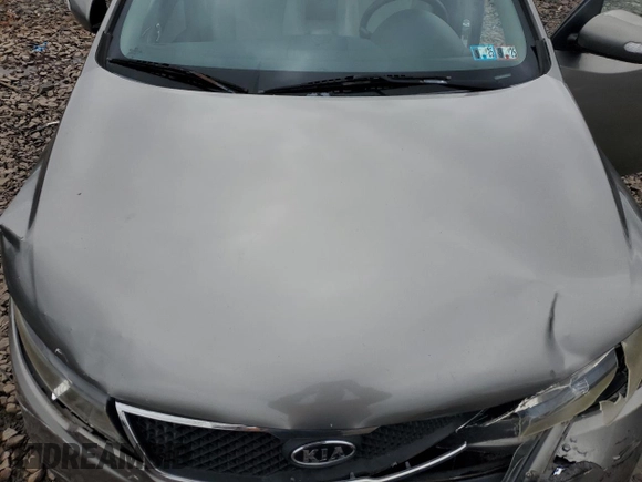 2010 Kia Forte EX z VIN KNAFU4A2XA5250756, wystawiony jako Copart lot #58743405 z przebiegiem 204 266 mil mil oraz Szkoda całkowita • Salvage title. Historia ofert i sprzedaży dostępna na DreamBid. Obrazek 11.