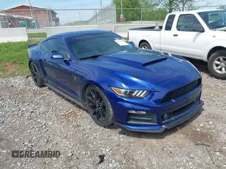 2015 Ford Mustang V6 with VIN 1FA6P8AM7F5312159, listed as a IAAI auction lot 42095665 with 113,693 mi miles and . Bid and sale history available at carsss.com. Image 1.