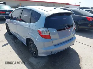 2009 Honda Fit with VIN JHMGE88289S004009, listed as a IAAI auction lot 41803838 with 194,304 mi miles. Bid and sale history available at carsss.com. Image 3.