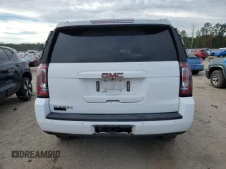 2015 GMC Yukon SLE with VIN 1GKS2AKCXFR744083, listed as a Copart auction lot 82003234 with 150,926 mi miles and Salvage Title. Bid and sale history available at carsss.com. Image 6.