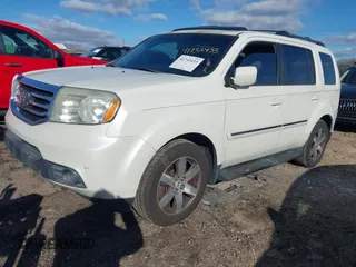 2013 Honda Pilot Touring with VIN 5FNYF3H95DB012903, listed as a IAAI auction lot 41732433 with 160,805 mi miles and . Bid and sale history available at carsss.com. Image 2.