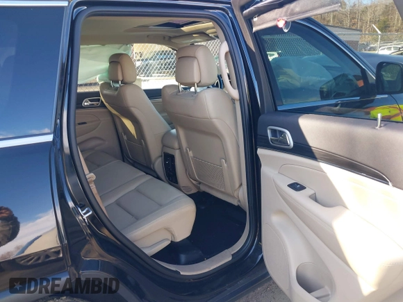 2021 Jeep Grand Cherokee 80th Anniversary with VIN 1C4RJFBG0MC801971, listed as a IAAI auction lot 41661098 with 31,961 mi miles and . Bid and sale history available at DreamBid. Image 8.