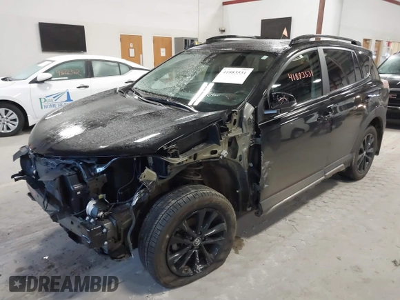 2018 Toyota RAV4 XLE with VIN 2T3RFREV0JW715761, listed as a IAAI auction lot 41881863 with 67,534 mi miles and . Bid and sale history available at DreamBid. Image 18.