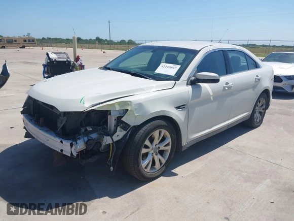 2011 Ford Taurus SEL z VIN 1FAHP2HW7BG148004, wystawiony jako IAAI lot #42245047 z przebiegiem 102 999 mil mil oraz . Historia ofert i sprzedaży dostępna na DreamBid. Obrazek 2.