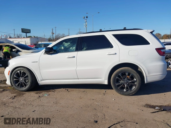 2023 Dodge Durango R/T Plus with VIN 1C4SDHCT5PC589797, listed as a IAAI auction lot 41472148 with 34,980 mi miles and . Bid and sale history available at DreamBid. Image 14.
