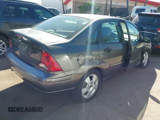 2003 Ford Focus SE with VIN 1FAFP34353W228000, listed as a IAAI auction lot 41682503 with 107,968 mi miles and . Bid and sale history available at carsss.com. Image 4.