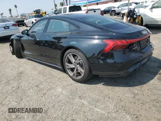 2023 Audi e-tron GT Prestige z VIN WAUDJBFWXP7003055, wystawiony jako Copart lot #71028874 z przebiegiem 7107 mil mil oraz Szkody całkowita. Historia ofert i sprzedaży dostępna na DreamBid. Obrazek 2.