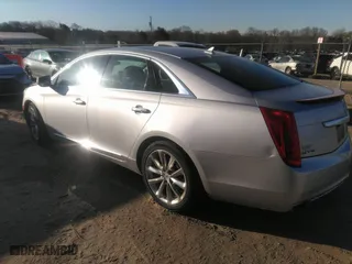2014 Cadillac XTS Luxury with VIN 2G61M5S30E9187222, listed as a IAAI auction lot 41842676 with 113,594 mi miles. Bid and sale history available at carsss.com. Image 3.