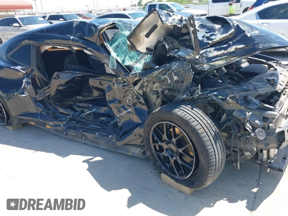 2014 Chevrolet Camaro LS z VIN 2G1FA1E32E9126043, wystawiony jako IAAI lot #42253189 z przebiegiem 104 457 mil mil oraz . Historia ofert i sprzedaży dostępna na DreamBid. Obrazek 6.