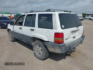 1994 Jeep Grand Cherokee Laredo with VIN 1J4FX58SXRC120936, listed as a IAAI auction lot 42530212 with 126,367 mi miles and . Bid and sale history available at DreamBid. Image 3.