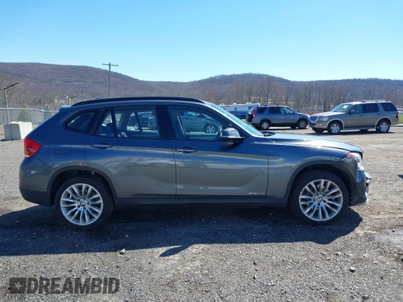 2015 BMW X1 xDrive28i with VIN WBAVL1C59FVY25442, listed as a IAAI auction lot 41854794 with 98,432 mi miles. Bid and sale history available at carsss.com. Image 13.