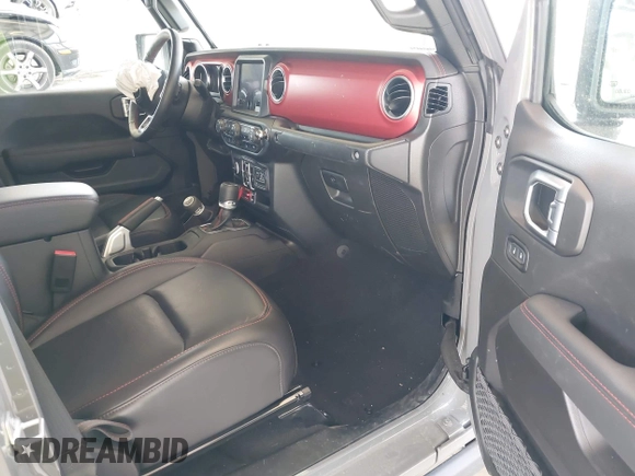 2022 Jeep Gladiator Rubicon with VIN 1C6JJTBG6NL166081, listed as a IAAI auction lot 42204431 with 40,568 mi miles and . Bid and sale history available at DreamBid. Image 5.