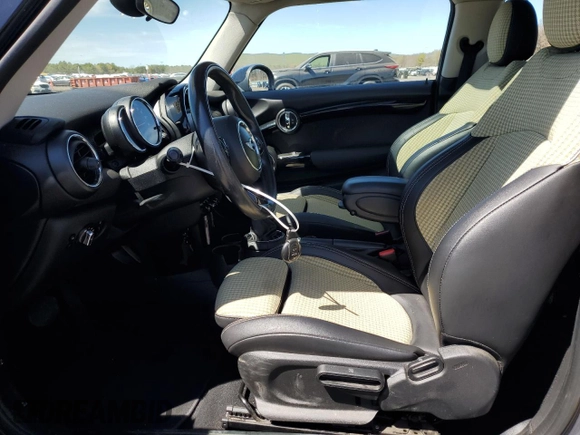 2014 MINI Hardtop S with VIN WMWXM7C54ET985344, listed as a Copart auction lot 55242945 with 87,017 mi miles and Salvage Title. Bid and sale history available at DreamBid. Image 7.