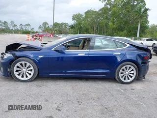 2016 Tesla Model S 70 with VIN 5YJSA1E10GF141725, listed as a IAAI auction lot 41878171 with 119,025 mi miles and . Bid and sale history available at DreamBid. Image 14.