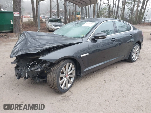 2014 Jaguar XF V6 SC with VIN SAJWJ0EF9E8U12853, listed as a IAAI auction lot 41780409 with 138,329 mi miles. Bid and sale history available at carsss.com. Image 18.