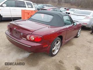 2003 Mazda MX-5 Miata Cloth z VIN JM1NB353X30308589, wystawiony jako IAAI lot #41454795 z przebiegiem 110 940 mil mil oraz . Historia ofert i sprzedaży dostępna na DreamBid. Obrazek 4.