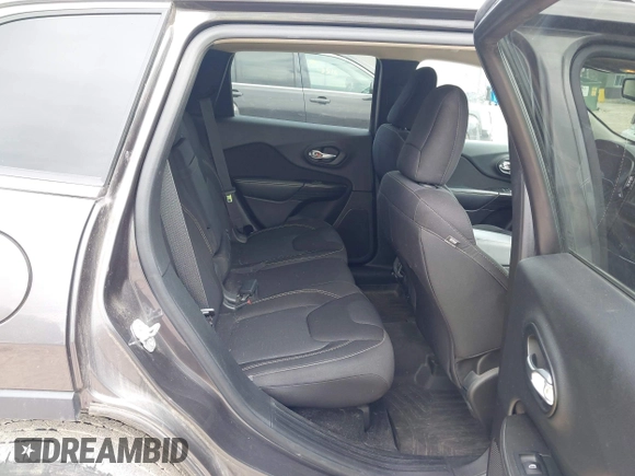 2015 Jeep Cherokee Latitude with VIN 1C4PJLCS9FW542181, listed as a IAAI auction lot 42183167 with 144,607 mi miles and . Bid and sale history available at carsss.com. Image 8.