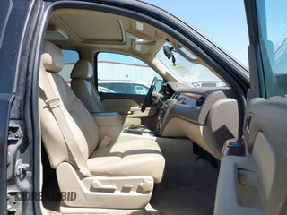 2012 Chevrolet Tahoe LT with VIN 1GNSCBE07CR229240, listed as a IAAI auction lot 41837063 with 219,901 mi miles and . Bid and sale history available at DreamBid. Image 5.