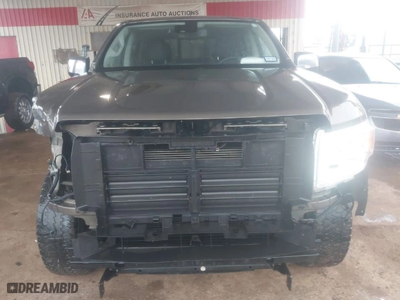 2016 GMC Canyon 4WD SLT with VIN 1GTG6DE35G1100042, listed as a IAAI auction lot 41387193 with 198,004 mi miles. Bid and sale history available at carsss.com. Image 6.