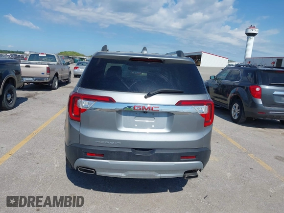 2023 GMC Acadia SLT with VIN 1GKKNML46PZ130813, listed as a IAAI auction lot 42614040 with 56,086 mi miles and . Bid and sale history available at DreamBid. Image 16.