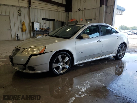 2009 Pontiac G6 with VIN 1G2ZL577894230250, listed as a Copart auction lot 63275235 with 166,792 mi miles and Clean title. Bid and sale history available at DreamBid. Image 1.