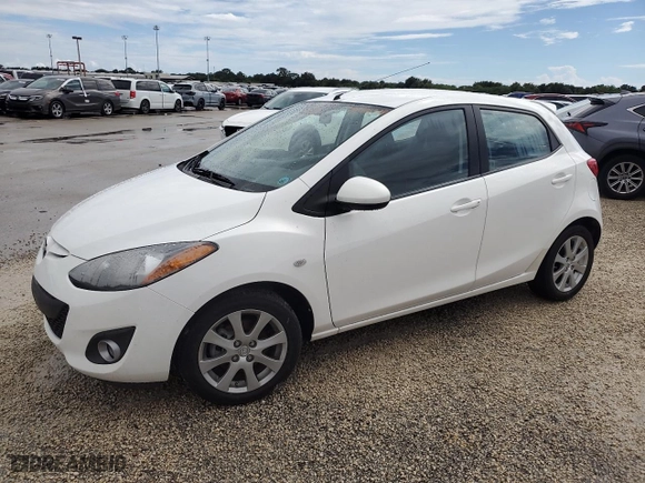 2012 Mazda Mazda2 Touring with VIN JM1DE1LY8C0137590, listed as a Copart auction lot 74488974 with 0 mi miles and Salvage Title. Bid and sale history available at carsss.com. Image 1.