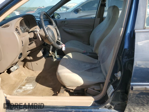 2001 Ford Escort Fleet with VIN 3FAFP13PX1R120920, listed as a Copart auction lot 75643024 with 128,089 mi miles and Salvage title. Bid and sale history available at DreamBid. Image 7.