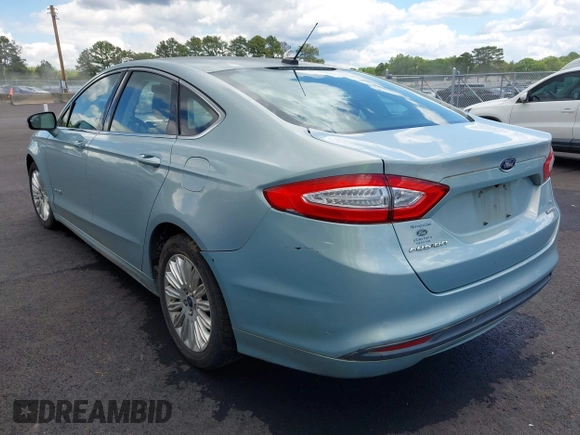 2014 Ford Fusion SE Hybrid with VIN 3FA6P0LU7ER154559, listed as a IAAI auction lot 42198548 with 244,630 mi miles. Bid and sale history available at carsss.com. Image 3.