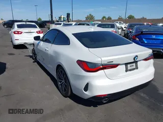 2022 BMW 4 Series 430i xDrive with VIN WBA73AP03NCH61029, listed as a IAAI auction lot 42327779 with 104,860 mi miles and . Bid and sale history available at DreamBid. Image 3.