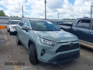 2019 Toyota RAV4 XLE with VIN 2T3W1RFV3KW056351, listed as a IAAI auction lot 42011662 with 64,634 mi miles. Bid and sale history available at carsss.com. Image 1.