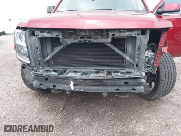 2015 Chevrolet Tahoe LT with VIN 1GNSCBKC1FR721605, listed as a IAAI auction lot 42184896 with 200,983 mi miles and . Bid and sale history available at DreamBid. Image 6.