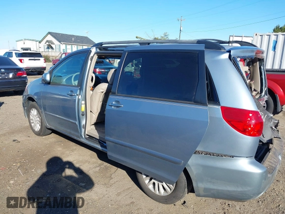 2010 Toyota Sienna XLE with VIN 5TDYK4CC6AS320562, listed as a IAAI auction lot 41005929 with 105,082 mi miles and . Bid and sale history available at DreamBid. Image 3.
