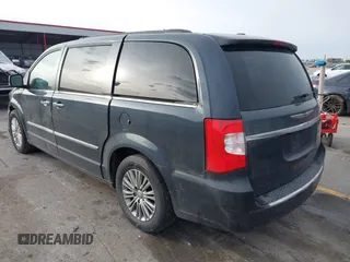 2014 Chrysler Town & Country Touring L 30th Anniversary z VIN 2C4RC1CG4ER133192, wystawiony jako IAAI lot #41113205 z przebiegiem 191 964 mil mil oraz . Historia ofert i sprzedaży dostępna na DreamBid. Obrazek 3.