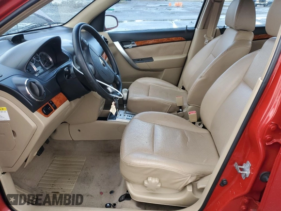 2009 Chevrolet Aveo 2LT z VIN KL1TG66E29B330570, wystawiony jako Copart lot #77913364 z przebiegiem 134 939 mil mil oraz Szkoda całkowita • Salvage title. Historia ofert i sprzedaży dostępna na DreamBid. Obrazek 7.