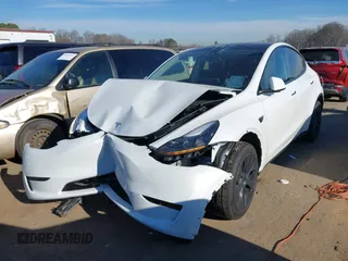 2025 Tesla Model Y Long Range with VIN 7SAYGDED9SA342374, listed as a IAAI auction lot 41663085 with 4,115 mi miles and . Bid and sale history available at DreamBid. Image 20.