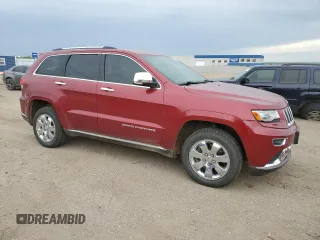 2014 Jeep Grand Cherokee Summit z VIN 1C4RJFJT8EC359165, wystawiony jako Copart lot #57037225 z przebiegiem 163 372 mil mil oraz Szkoda całkowita • Salvage title. Historia ofert i sprzedaży dostępna na DreamBid. Obrazek 4.