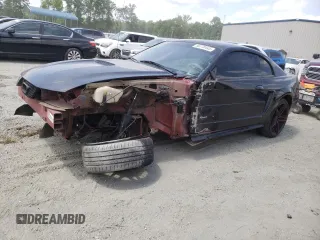 2001 Ford Mustang Standard with VIN 1FAFP40471F217808, listed as a Copart auction lot 56170445 with 116,913 mi miles and Salvage title. Bid and sale history available at DreamBid. Image 1.