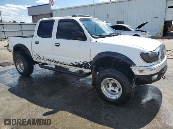2002 Toyota Tacoma PreRunner with VIN 5TEGN92N02Z887650, listed as a Copart auction lot 49416255 with 290,615 mi miles and Salvage Title. Bid and sale history available at DreamBid. Image 4.