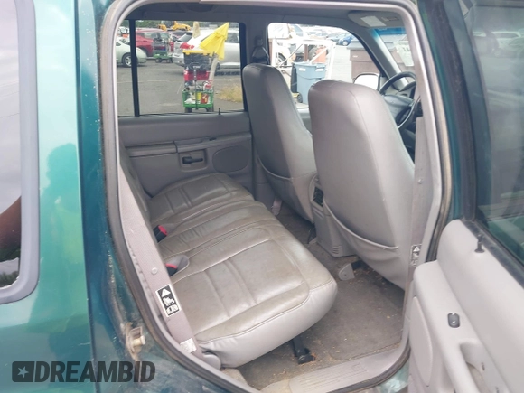 1999 Ford Explorer XLT with VIN 1FMZU34E1XZB72588, listed as a IAAI auction lot 42598441 with 233,717 mi miles and . Bid and sale history available at DreamBid. Image 8.
