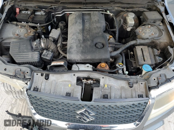 2009 Suzuki Grand Vitara with VIN JS3TD042694100821, listed as a Copart auction lot 57209065 with 89,362 mi miles and Salvage title. Bid and sale history available at DreamBid. Image 12.