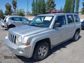2010 Jeep Patriot Sport with VIN 1J4NT2GBXAD660180, listed as a IAAI auction lot 42146950 with 217,054 mi miles. Bid and sale history available at carsss.com. Image 2.