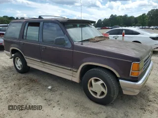 1994 Ford Explorer Eddie Bauer z VIN 1FMDU32X8RUB49646, wystawiony jako Copart lot #85906804 z przebiegiem 11 802 mil mil oraz Szkoda całkowita • Salvage title. Historia ofert i sprzedaży dostępna na DreamBid. Obrazek 4.