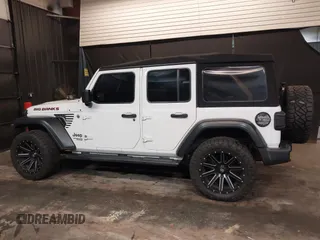 2019 Jeep Wrangler Unlimited Sport S z VIN 1C4HJXDG4KW639403, wystawiony jako IAAI lot #42158096 z przebiegiem 132 569 mil mil oraz . Historia ofert i sprzedaży dostępna na DreamBid. Obrazek 15.