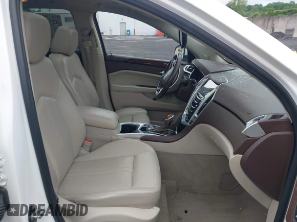 2013 Cadillac SRX Performance Collection with VIN 3GYFNHE34DS628486, listed as a IAAI auction lot 42530124 with 76,778 mi miles and . Bid and sale history available at DreamBid. Image 5.