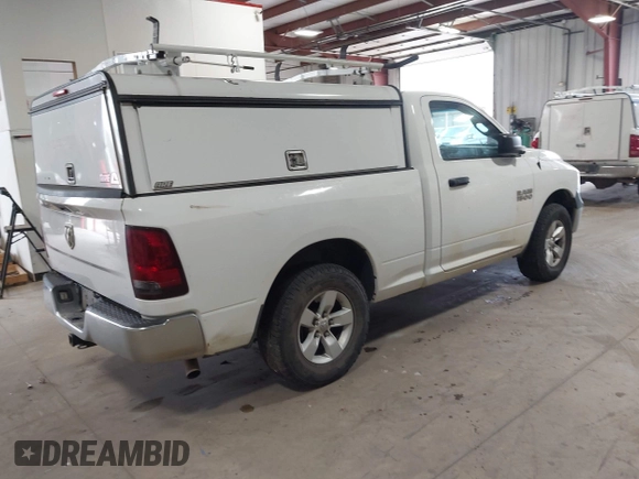 2015 Ram 1500 Tradesman with VIN 3C6JR7AG9FG543809, listed as a IAAI auction lot 42560120 with 168,793 mi miles and . Bid and sale history available at DreamBid. Image 4.