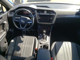 2023 Volkswagen Tiguan SE R-Line Black with VIN 3VV8B7AX3PM090643, listed as a Copart auction lot 52225065 with 60,680 mi miles and Salvage title. Bid and sale history available at DreamBid. Image 8.