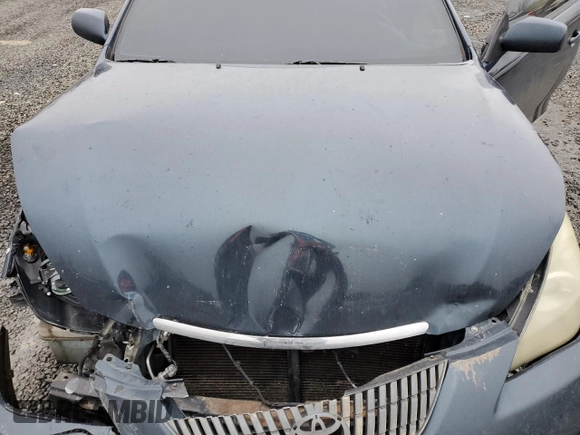 2005 Toyota Solara SE z VIN 4T1CA38P45U059139, wystawiony jako Copart lot #44995395 z przebiegiem 220 487 mil mil oraz Szkoda całkowita • Salvage title. Historia ofert i sprzedaży dostępna na DreamBid. Obrazek 12.