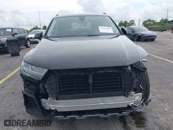 2018 Audi Q7 Prestige with VIN WA1VABF72JD024890, listed as a IAAI auction lot 42464089 with 76,643 mi miles and . Bid and sale history available at DreamBid. Image 6.