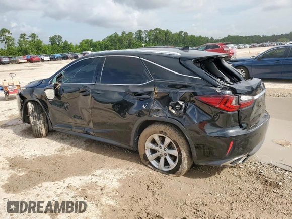 2016 Lexus RX 350 с VIN 2T2ZZMCA9GC001717, выставлен на аукционе Copart как лот 63850605 с пробегом 74 609 миль миль и Списание • Salvage title. История ставок и продаж доступна на DreamBid. Изображение 2.