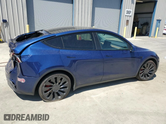 2022 Tesla Model Y Performance with VIN 7SAYGDEF4NF489629, listed as a Copart auction lot 64181775 with 22,120 mi miles and Salvage title. Bid and sale history available at DreamBid. Image 3.